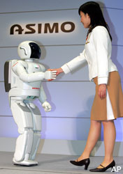Woman shaking hands with robot