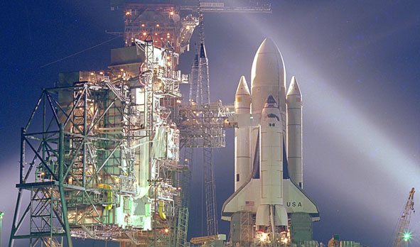 The shuttle Columbia on the launch pad for the first NASA shuttle mission, STS-1