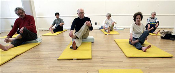 Seniors doing yoga