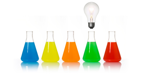 Beakers with a light bulb above