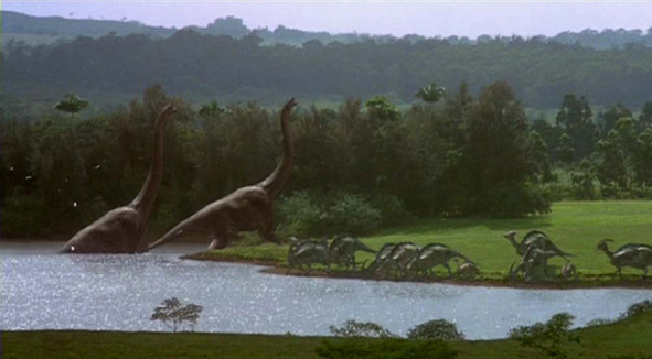Screen shot from Jurassic Park of dinosaurs drinking from river