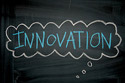 chalkboard within thought bubble on it that says INNOVATION