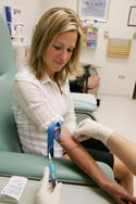 woman getting blood drawn for warfarin