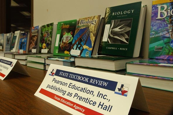 Some of the biology textbooks under consideration by the State Board of Education at the board meeting in 2003.