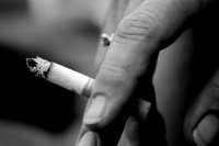 Hand holding cigarette