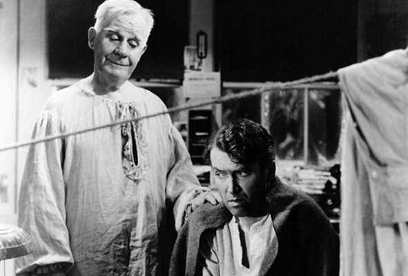 film still from Its A Wonderful Life with Clarance Odbody and George Bailey