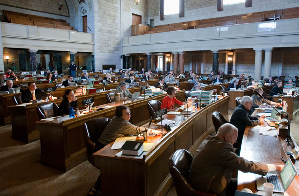 Nebraska lawmakers vote on a bill following a final reading, in Lincoln, Neb., Friday, April 9, 2010
