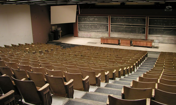 empty old lecture hall with chalkboards