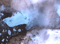 A giant glacier breaks off Greenland's Petermann Glacier